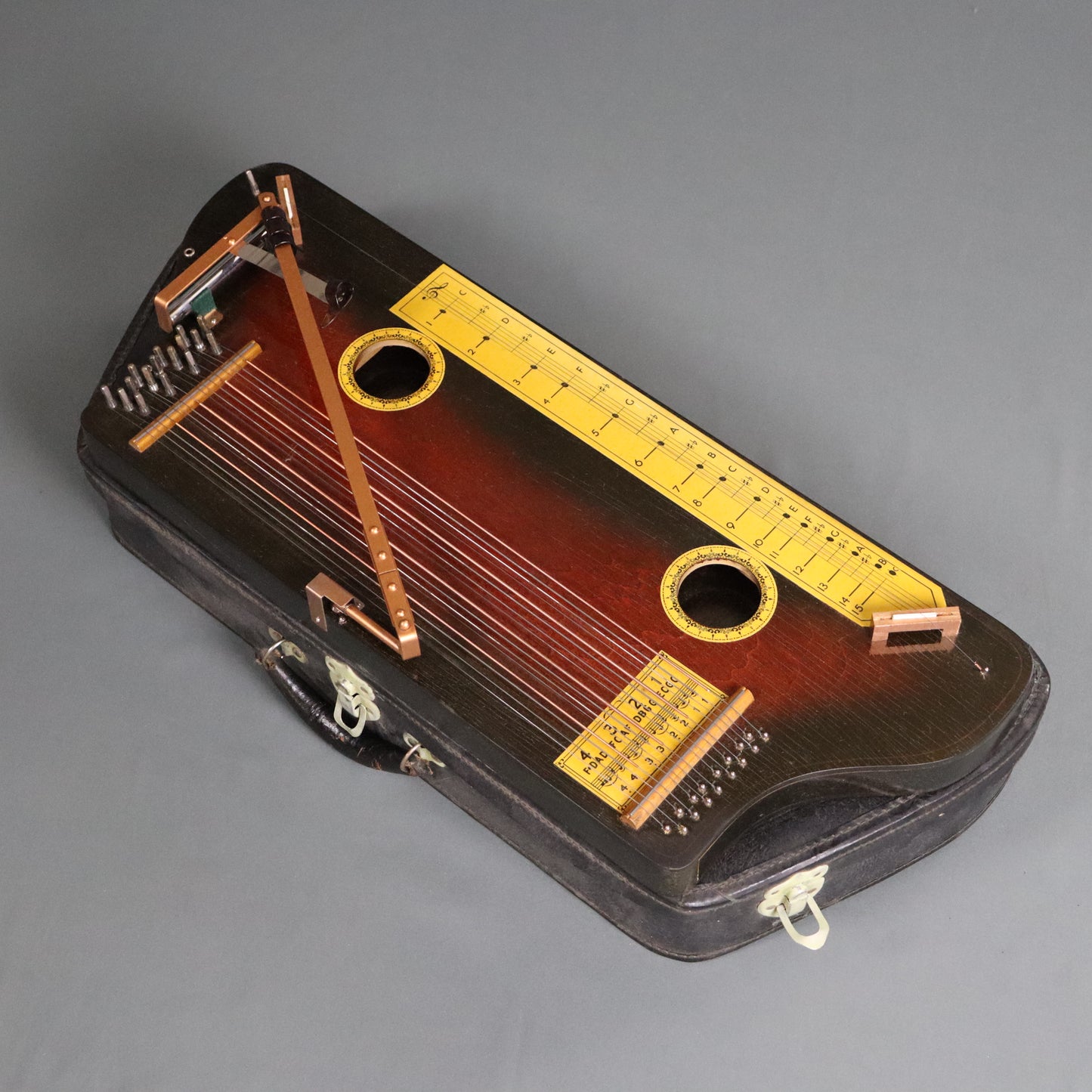 Manufacturers Advertising Company Hawaiian Tremoloa with Case, Music, Directions, Picks, and other Case Candy
