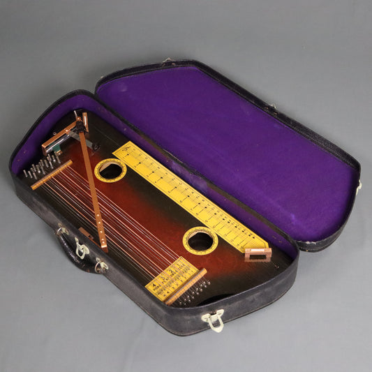 Manufacturers Advertising Company Hawaiian Tremoloa with Case, Music, Directions, Picks, and other Case Candy